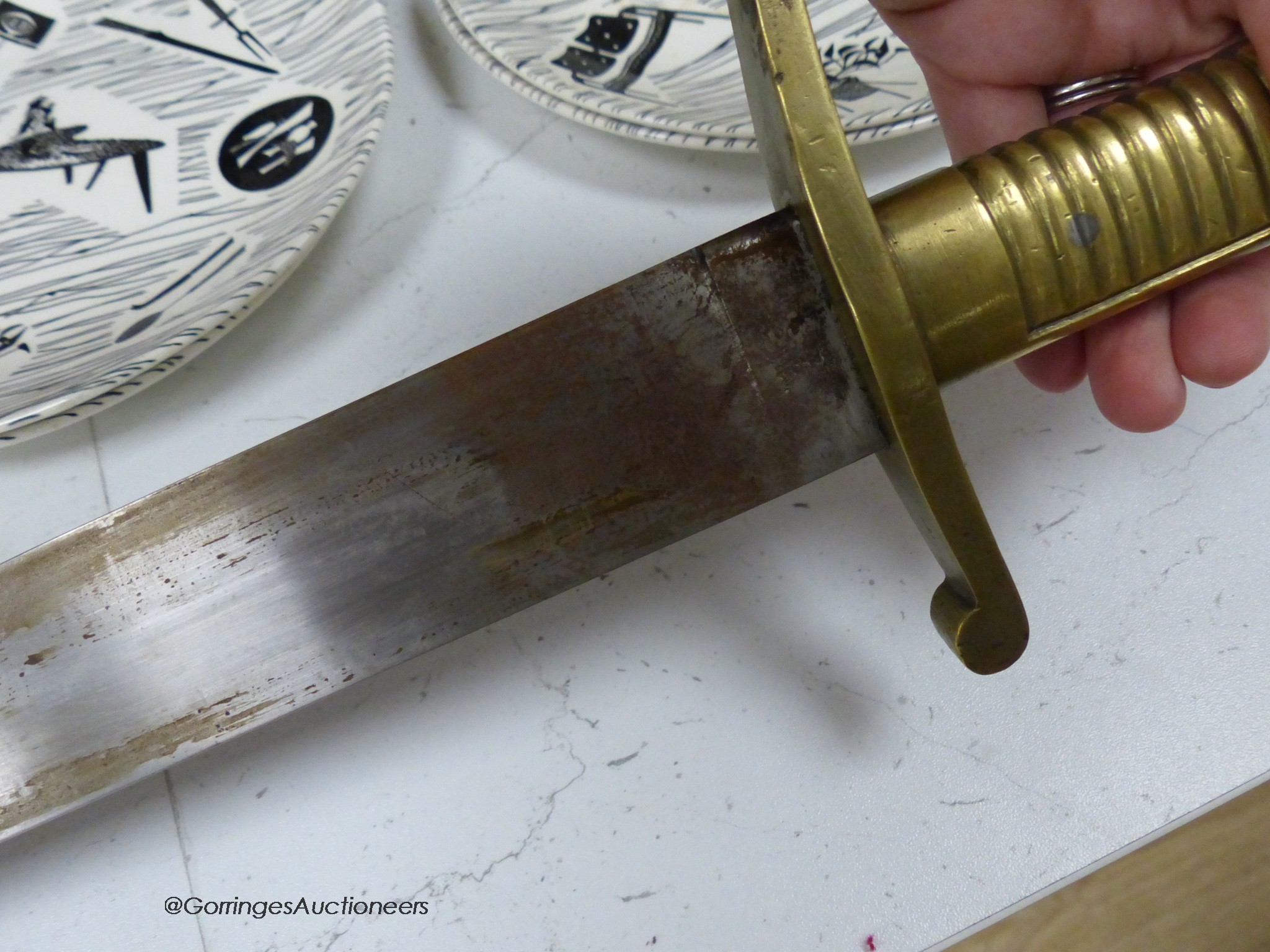 A French short sword and sheath, both marked 12.A.F.7.127